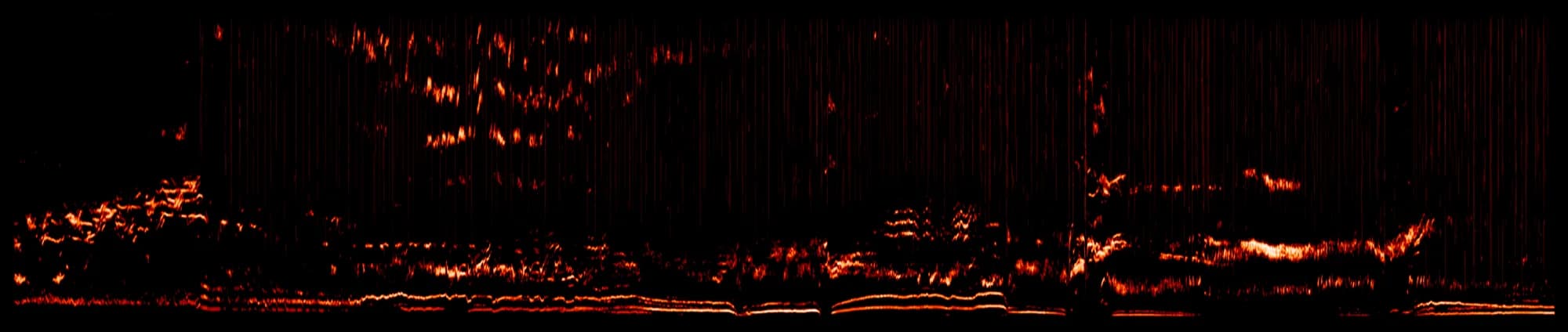 A magnetics spectrogram from a DIII-D plasma discharge, showing frequency changing over time